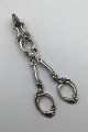 A Dragsted 
Silver Sugar 
Tongs (1919) 
Measures 14 cm 
(5.51inch)