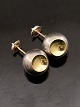 Georg Jensen 
design 
Jacqueline 
Rabun "Cave" 
earrings 
sterling silver 
with gold item 
no. 558029