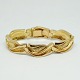 Per Borup; Bracelet of 14k. gold.Clasp with two safety catches.L. 17 cm. W. 1.5 cm.Stamped ...