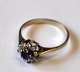 14 carat white 
gold ring with 
amethyst and 9 
diamonds. 20th 
century 
Denmark. 
Stamped: Herman 
...