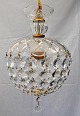 Glass prism, 
20th century. 
Dome with 
grindings and 
110 prisms. H.: 
33 cm. Dia.: 20 
cm.
Great ...