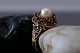 This gold ring is so elegant and exclusive, that it is a small masterpiece in itself. The ring ...