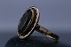 Nice gold ring with inlaid smoke topaz, and nice simple design. The ring's house with smoke ...