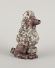 EGO Stengods, 
Sweden. Ceramic 
figure of a 
poodle. Glazed 
in 
brownish-green 
...
