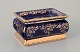 Limoges, France. A porcelain covered box decorated with 22-karat gold leaf and 
beautiful royal blue glaze. Scène galante.