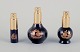 Limoges, 
France. Three 
porcelain 
perfume 
bottles, 
decorated with 
22-karat gold 
leaf and a ...