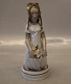 12461 RC 
Huguenot Girl 
21 cm Arno 
Malinowski 1927 
Royal 
Copenhagen  In 
mint and nice 
...