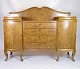 Antique birch 
sideboard with 
4 drawers in 
the middle and 
doors on each 
side from 
around the ...