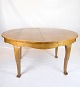 Dining table with additional plates made of birch wood from around the 1920s.Dimensions in cm: ...