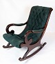 Rocking chair 
with green wool 
tuft made in 
mahogany from 
around the 
1930s.
Measurements 
in cm: ...