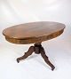 Round Late Empire mahogany dining table with 3 legs from around the 1840s.Measurements in cm: ...