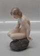 Royal 
Copenhagen 4027 
RC Nude Girl on 
rock Ada 
Bonfils 15 cm  
In mint and 
nice condition
