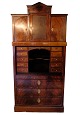 High mahogany secretary with marquetry and brass fittings from around the 1840s.Measurements ...