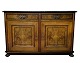 Light mahogany 
sideboard with 
2 doors and 2 
drawers and 
round legs from 
around the ...