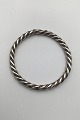 Twisted Silver 
Bangle(900) 
Measures Diam 
inside 6.2 cm 
(2.44 inch) 
Weight 26.7 gr 
(0.94 oz)