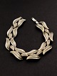 Trifari 
bracelet 18 cm. 
W. 1.6 cm. 
subject no. 
559421