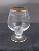 Seagull glassware with gold rim from Denmark. 
Cognac glasses 8.5cm