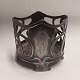 Wine coaster 
made in pewter 
in Art Nouveau 
style by the 
Württembergische 
metallwarenfabrik 
in ...