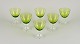 Val St. Lambert, Belgium. A set of six white wine glasses in green and clear 
mouth-blown crystal glass.