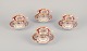 Royal Albert, England. A set of four "Lady Hamilton" coffee cups with saucers. 
Polychrome floral motifs. Gold decoration.