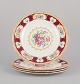 Royal Albert, England. A set of four "Lady Hamilton" dinner plates with 
polychrome floral motifs. Gold decoration.