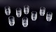 Jorma Vennola 
for Iittala. 
Eight "Kuusi" 
drinking 
glasses 
featuring 
motifs of fir 
trees. 
Late ...