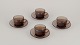 Vereco, 
Frankrig. A set 
of four coffee 
cups and 
saucers in 
smoked art ...