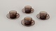 Vereco, Frankrig. A set of four coffee cups and saucers in smoked art ...