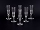 A set of six mouth-blown French champagne flutes in crystal glass. Faceted cut. 
Handmade.