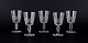 A set of five 
mouth-blown 
French white 
wine glasses in 
...