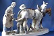 Large and 
beautiful 
porcelain 
figure, with a 
large and 
detailed motif 
of horses 
getting shoes 
...