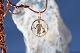 Pendant in 14 carat gold, the star sign Aquarius. Stamped 585