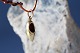 Nice little 
pendant in 14 
carat gold, 
shaped like 
clogs, red 
inside. The 
pendant is a 
simple ...