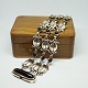 Georg Jensen 
silver 
jewellery.
A bracelet 
made in 
sterling 
silver, set 
with seven onyx 
stones. ...
