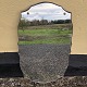 Mirror in a 
nice shape 
mounted on a 
wooden board. 
Dimensions: 
62x37 cm