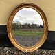 Small older 
mirror in a 
gold-painted 
frame, slightly 
patinated. 
Dimensions: 
45x37 cm