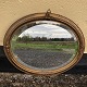 Faceted mirror 
in a painted 
wooden frame. 
Dimensions: 
48x58 cm