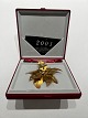 Georg Jensen's gilded Christmas clock from 2001 with the motif of a poinsettia and designed by ...