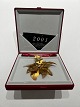 Georg Jensen's 
gilded 
Christmas clock 
from 2001 with 
the motif of a 
poinsettia and 
designed by ...