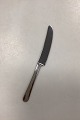 Georg Jensen 
Stainless 
'Copenhagen, 
Mirror' 
Luncheon Knife. 

Measures 20 cm 
/ 7.87 in.