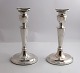 Toxvärd. Silver 
candlesticks 
with oval base 
(830). A pair. 
Height 19 cm.