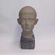 Heavy bust In 
stone of young 
man. Standing 
on base/plinth 
in stone. In 
good condition. 
Unknown ...