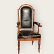 Large leather 
upholstered 
armchair. The 
wood is in good 
condition, but 
the leather 
cover has ...