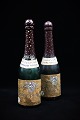 Decorative, old champagne bottle in turned wood, hollow inside with lid at the bottom. H: ...