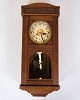 Wall clock in 
an oak box with 
pillared sides 
and a beautiful 
dial combines 
functionality 
with ...