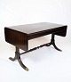 Mahogany coffee 
table by a 
Danish master 
carpenter 
decorated with 
lion feet of 
brass and wood 
...