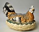 Porcelain hen, 
19th century 
Germany. Cold 
painted 
porcelain. 
Consisting of 
lid and base. 
L. 26 ...