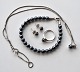 Pernille 
Corydon jewelry 
set in sterling 
silver with 
bloodstone 
(hematite). 
2015. Denmark. 
Set ...