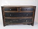 Black Painted chest of drawers with curved front and 4 drawers with patina from around the ...
