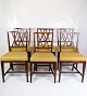 A set of six 
dining chairs, 
designed by Ole 
Wanscher and 
upholstered in 
bright yellow 
fabric, ...